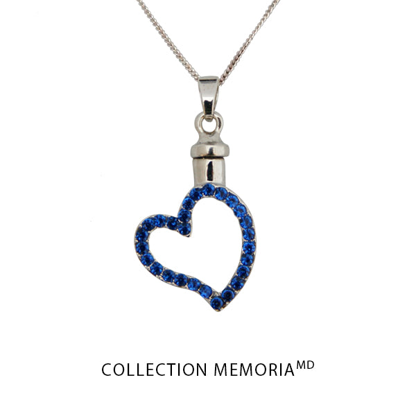 Pendentif cœur orné de pierres bleues
